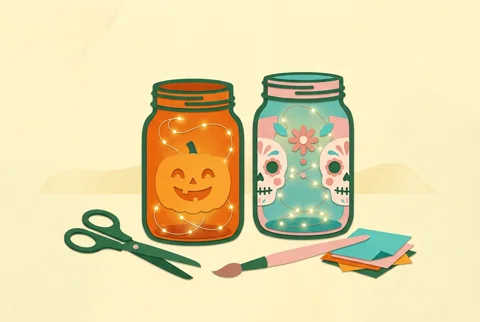Tarros decorados con calabaza y calaveras, iluminados con luces LED, junto a materiales de manualidades